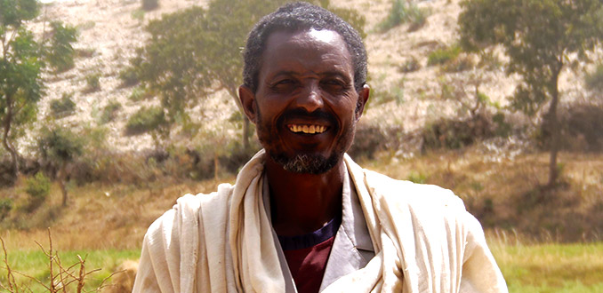 GebreMariam Desalegn from Tigray, Ethiopia, participates in two Irish Aid funded programmes, aimed at improving agricultural production and resilience to climate change.