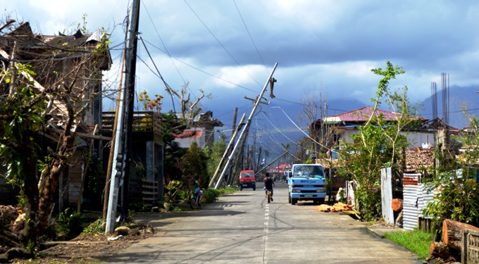 Electricity poles and cables which were damaged by Typhoon Haiyan line a street in Jaro, Leyte provence. Photo: Irish Aid