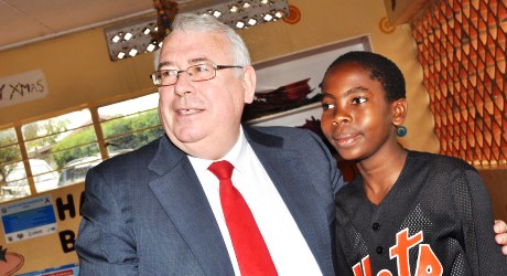 Minister Costello with Alan Tushabe, 15, at The AIDS Support Organisation, Central Uganda. 