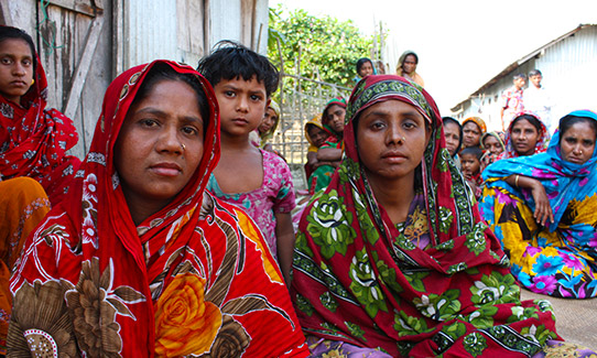 Fatema Begum, left, is a participant in a World Food Programme project which aims to equip communities to quote with future floods. Photo: WFP / Cornelia Paetz