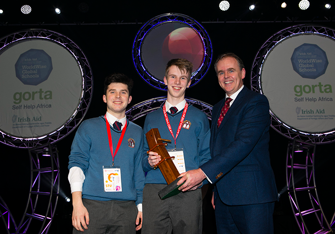 Minister of State for the Diaspora and Overseas Development Aid  Joe McHugh TD presents the Sicence for Development Award to Jack O'Connor, Diarmuid Curtin, Desmond College , Limerick for their project "Ergonomic Planter"  at the BTYS January 2017 (Credit: Fennell Photography)